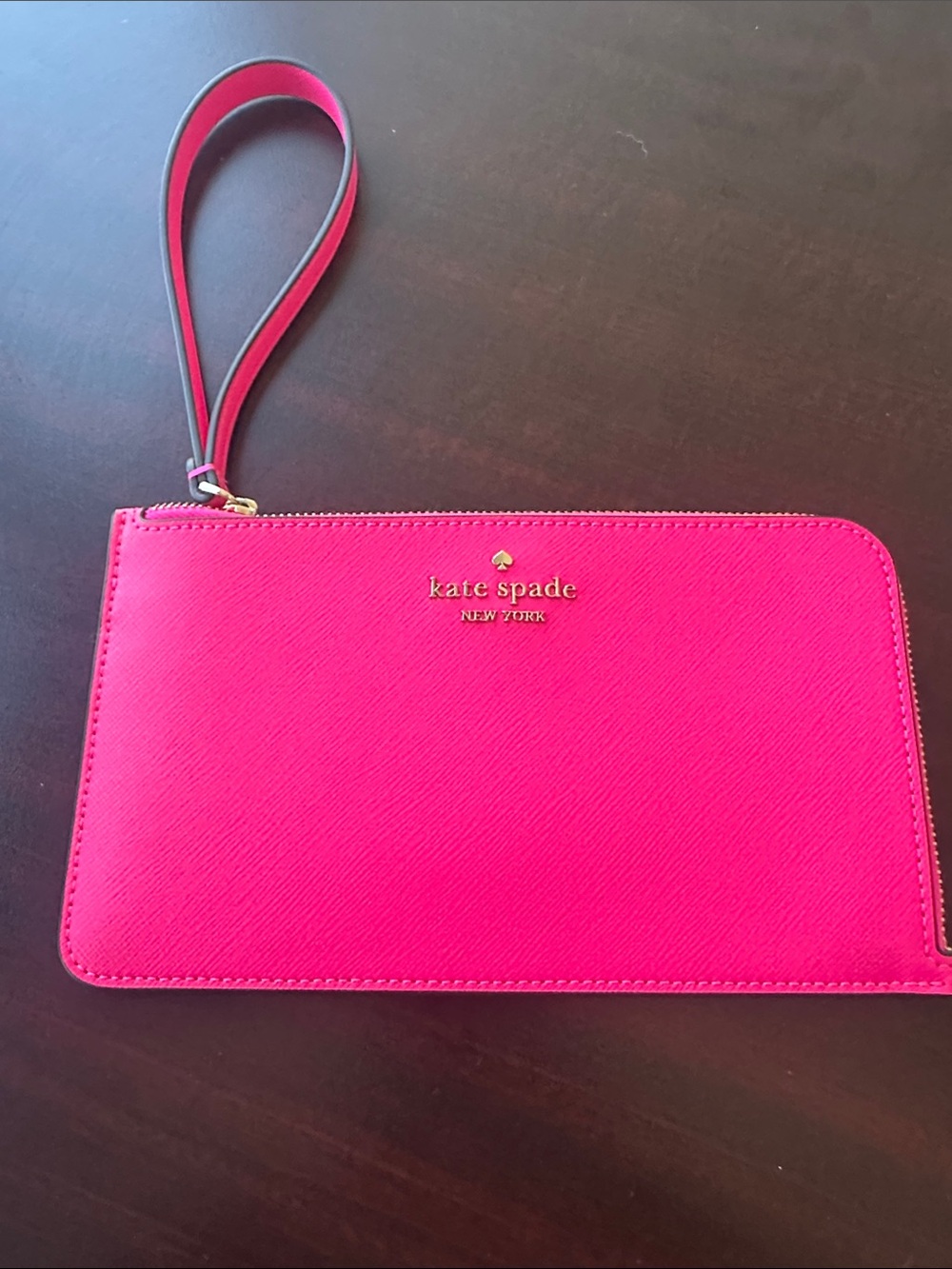 kate spade Bright Pink Zip Wristlet with Gold Logo